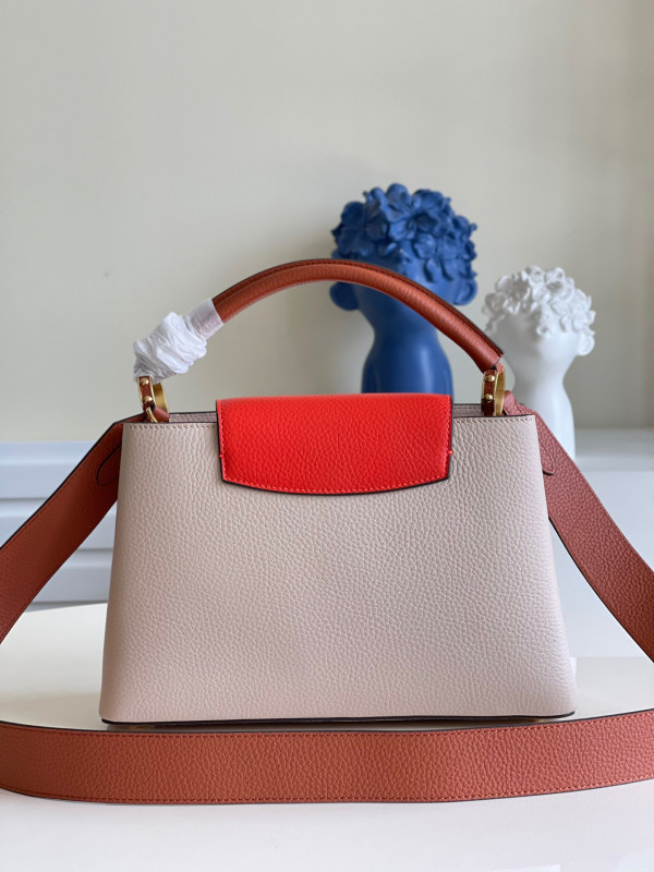 l0*is V*t0n capucines pm