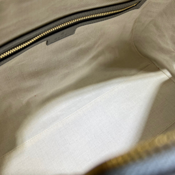 G*u*i gg matelassé leather top handle bag