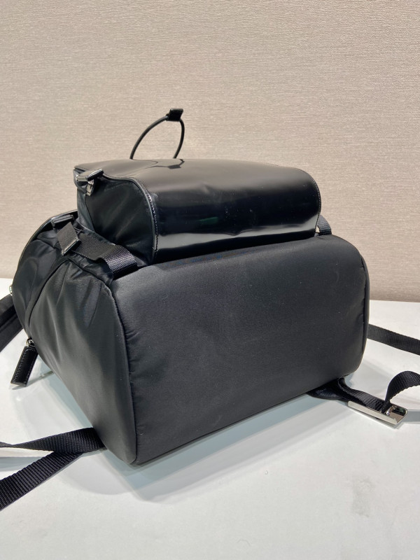 Pra*a re-nylon and brushed leather backpack