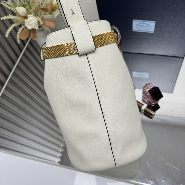 Pra*a buckle leather bucket bag with jeweled belt